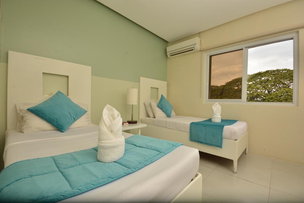 Empire Suites Hotel Puerto Princesa Exterior photo